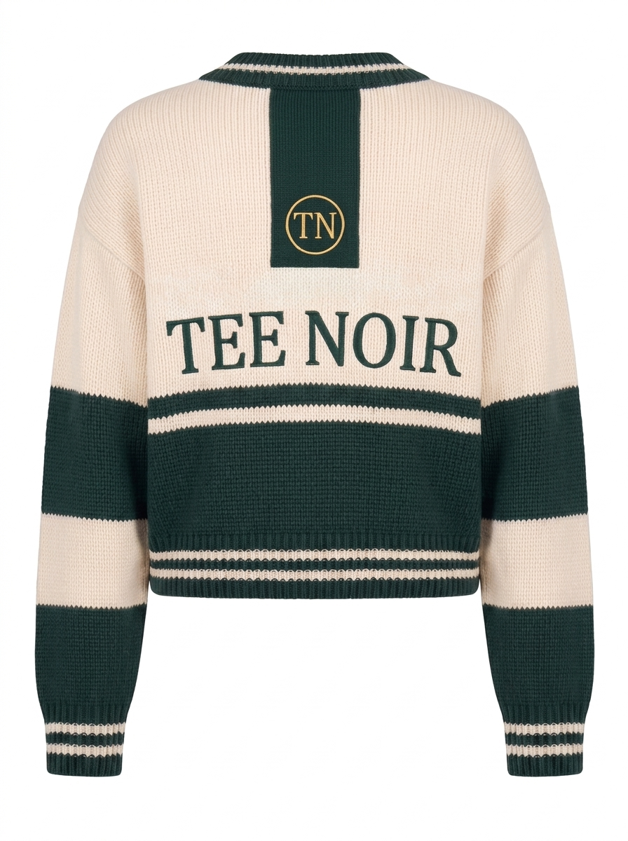 A cream and dark green striped knit sweater shown from the back, featuring a vertical green stripe with a circular TN logo and the words 'TEE NOIR' in dark green across the center.